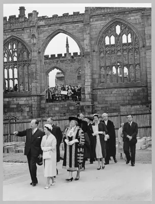 Architect Basil Spence taking HRH Princess Margaret on a tour of